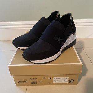 Michael Kors Felix Trainer black slip on sneakers size 7